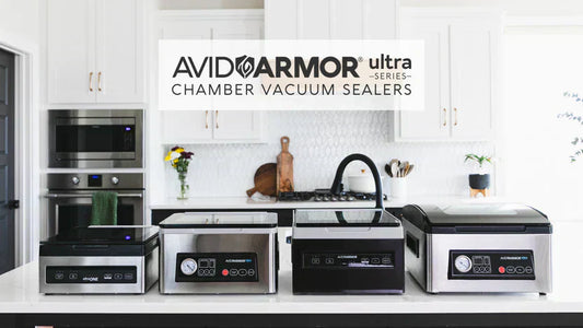 Lineup of Avid Armor Ultra Series chamber vacuum sealers in a modern kitchen