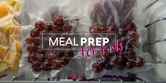 Portioned red grapes vacuum sealed in freezer bags for kids school lunches or snacks