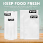 Rolls of vacuum sealer bags with dimensions on a wooden surface against a light green background.