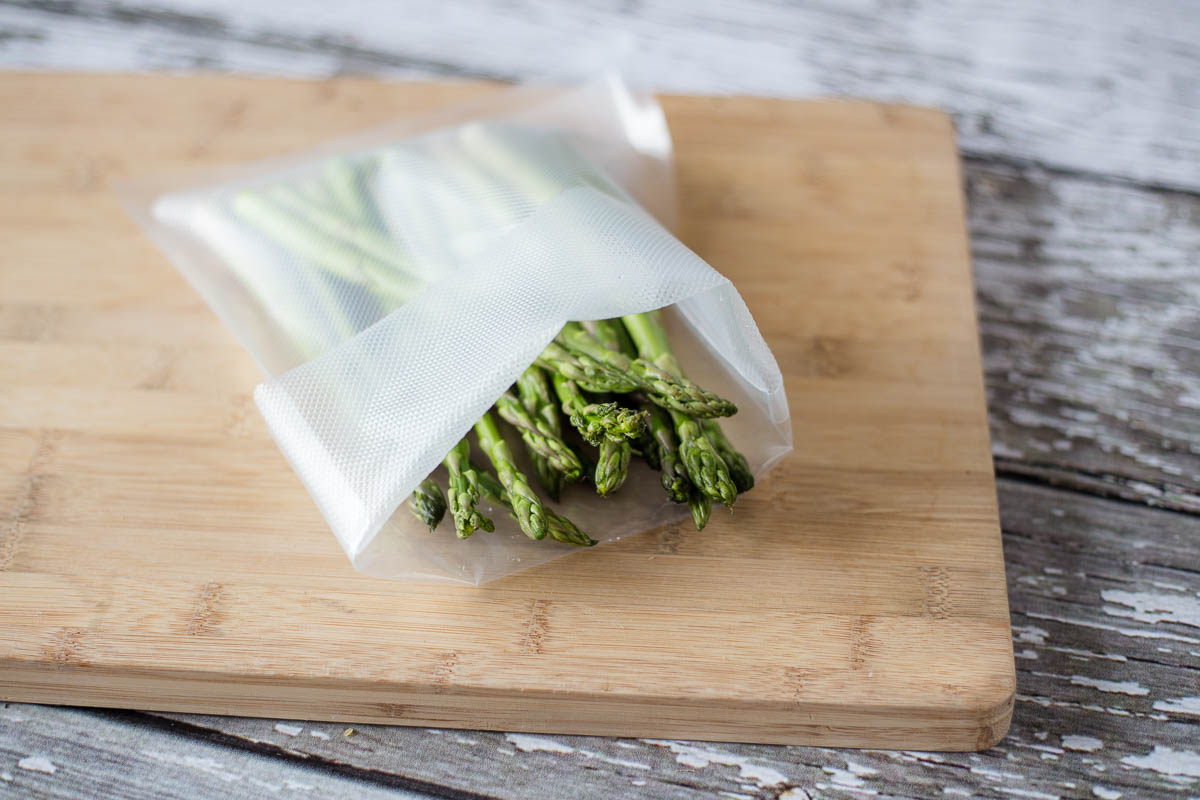 Fill the food vac bag with asparagus