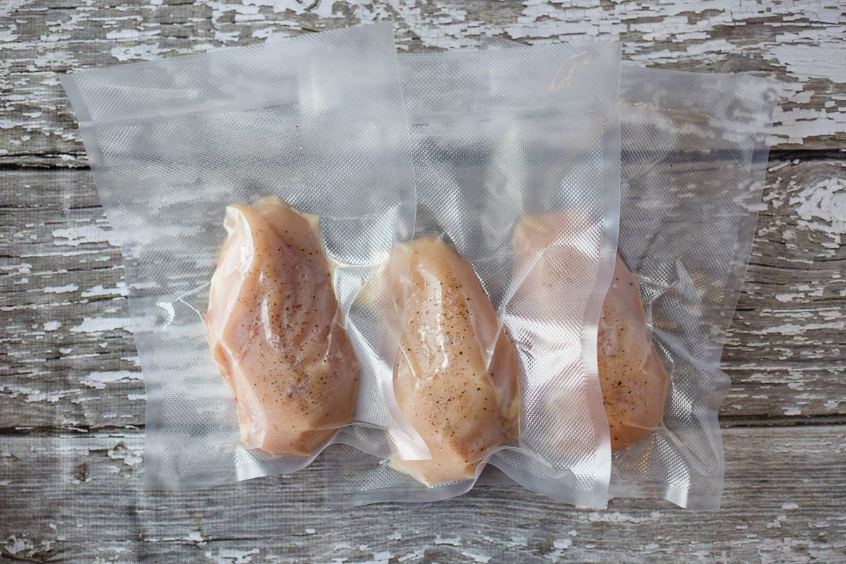 Single portion chicken breasts vacuum sealed in Avid Armor vacuum sealer bags