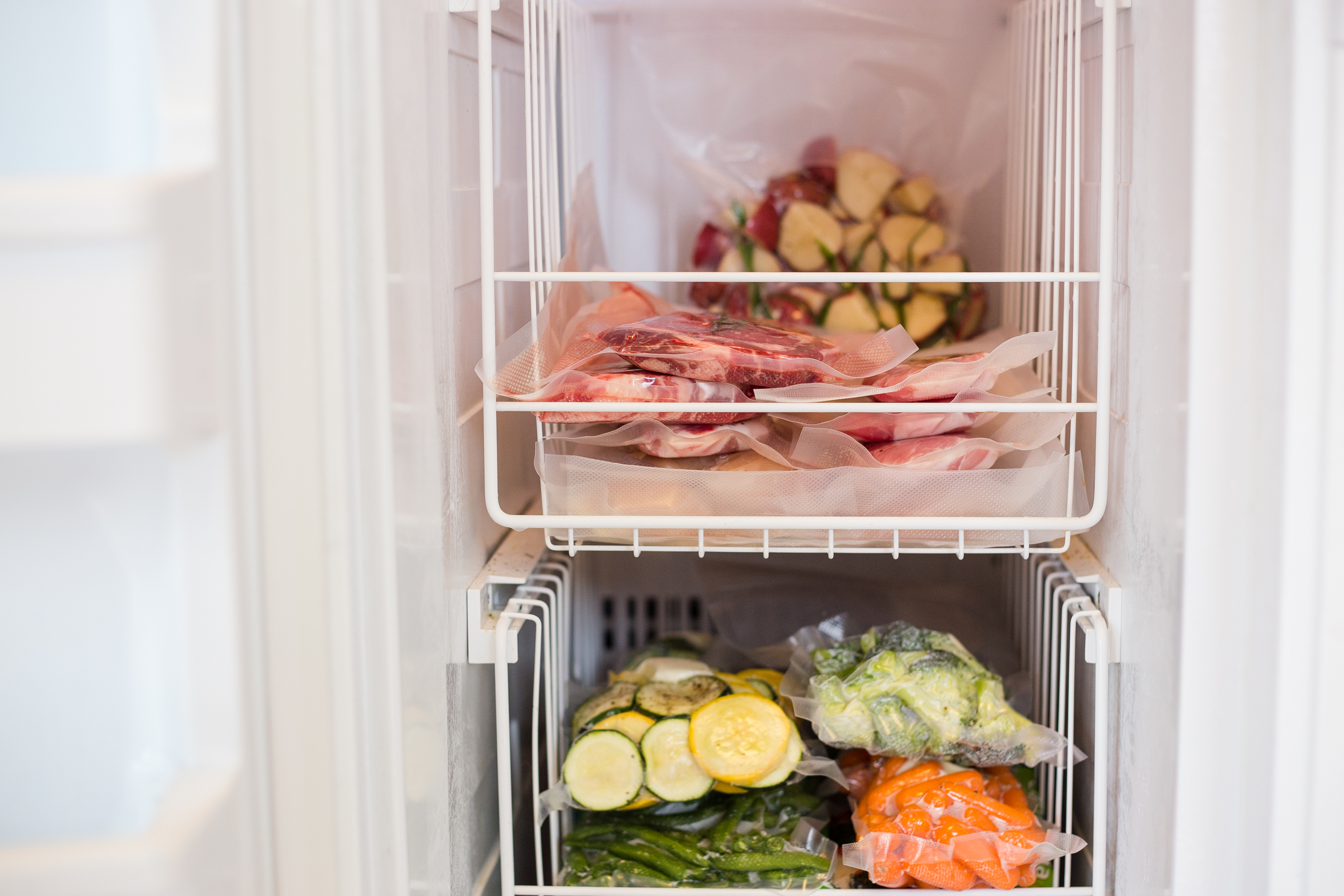 Organized freezer with vacuum sealed food