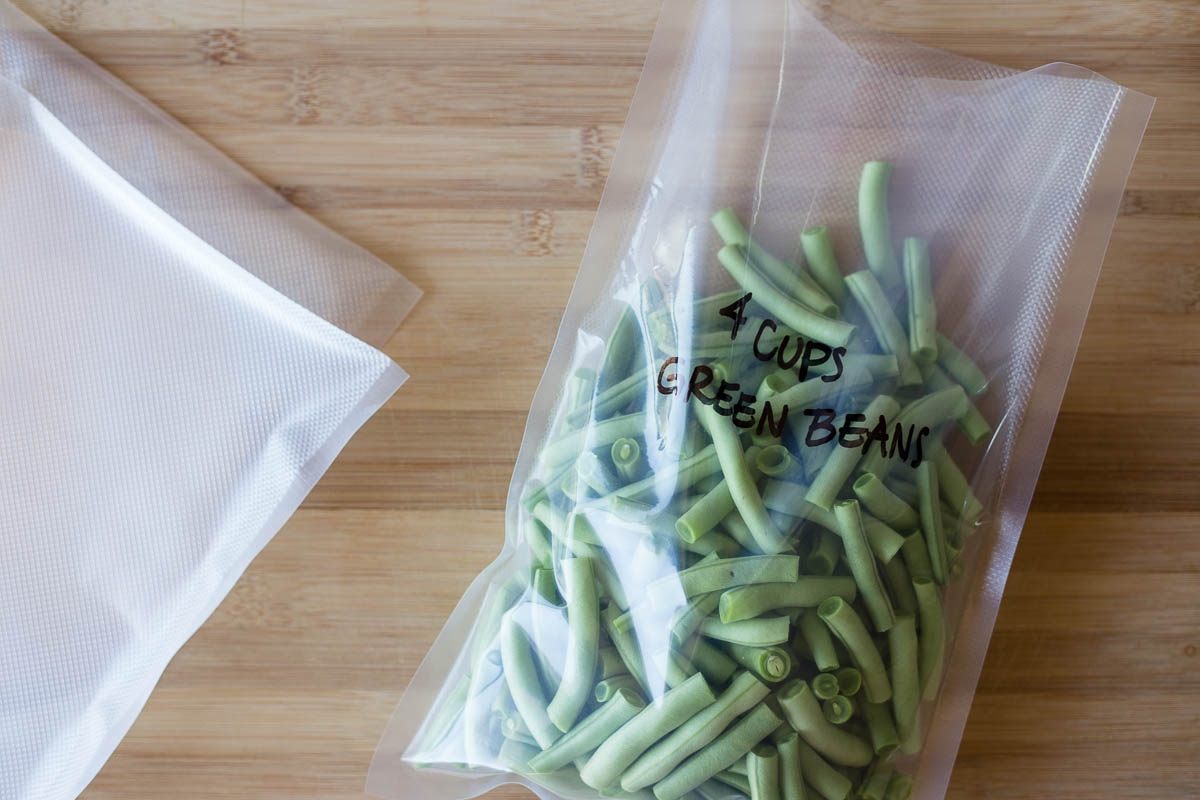 4 cups of green beans in a food vacuum seal bag