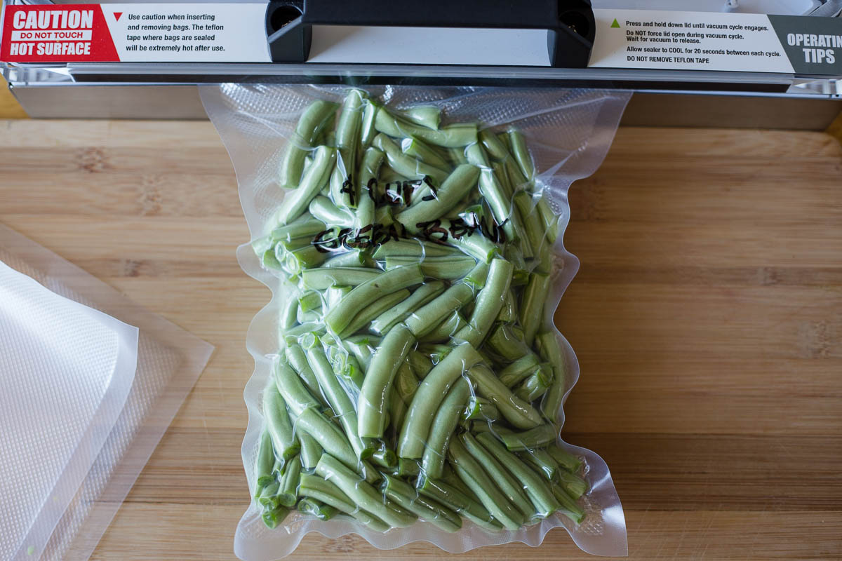 Green beans vacuum sealed for preserving taste and quality